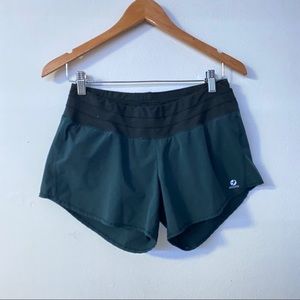 Oiselle dark navy and black running shorts